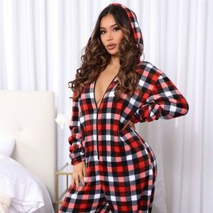 This is a fashion nova Christmas style jumpsuit!